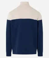Buzo de media malla con diseño de bloques de color, presentando la parte superior en beige y la inferior en azul marino, separadas por una línea blanca. Cuenta con cuello alto con cierre frontal parcial y puños acanalados.
