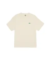 Remera de manga corta color crema, con cuello redondo y logo de la marca Obey bordado en pequeño en el pecho en color verde.