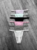 Pack de seis bombachas tipo colaless de algodón, con tiras laterales regulables y herrajes metálicos. El set incluye colores variados como blanco, gris, rosa, negro, verde agua y lila.