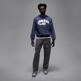 Hoodie Jordan MVP Fleece azul marino con capucha, bolsillo tipo canguro y estampado frontal estilo universitario con el texto "Jordan", el número 23 y el swoosh de Nike en color blanco. Presenta puños y dobladillo acanalados, además del logo Jumpman en la manga.