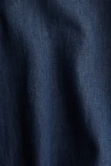 Pantalón tipo jean de corte holgado en denim suave, con diseño de piernas globo, cintura elástica con cordón de ajuste y bajos fruncidos con cordones ajustables.