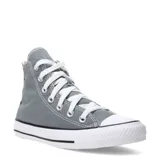 Championes de lona Converse modelo Chuck Taylor All Star Hi, de caña alta en color gris, con puntera de goma blanca, cordones blancos y suela de goma con franja negra.