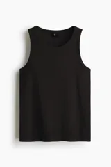 Musculosa H&M de corte ajustado, confeccionada en tejido de punto acanalado de mezcla de algodón. Presenta cuello redondo y bajo recto.