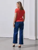 Buzo tejido en hilado fino color naranja, marca Ninety.