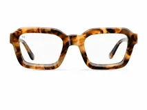 Lentes con armazón cuadrado de diseño inspirados en los años 70, con estampa carey en tonos marrones y caramelo, y cristales transparentes con protección contra luz azul y UV400.