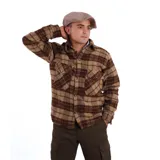 Camisa de manga larga con estampado de tartán en tonos azul marino, rojo y blanco. Confeccionada en 100% lana, con cuello abotonado y puños con botón. Corte clásico.