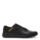 Zapatos Caterpillar modelo Hex + Cuero, color negro, estilo sneaker de caña baja con cordones. Presentan una capellada de cuero liso y textil, con suela de goma gruesa con patrón hexagonal en relieve. El logo Caterpillar en amarillo se encuentra en el lateral.
