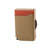 Billetera compacta Baleine de la colección Double Alabama, fabricada en cuero sintético color beige con detalles en naranja. Cuenta con doble compartimento de aluminio con sistema deslizante para tarjetas y protección RFID.