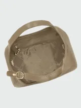 Cartera de mano Longchamp modelo Le Foulonné S, de diseño estructurado en tono beige claro con asas cortas.
