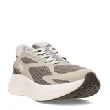 Championes Puma modelo Maxstride Lite Ls Sliptech, de color beige con suela blanca y detalles en marrón. Cuentan con capellada de malla transpirable, entresuela PUMALITE y suela ProTread.