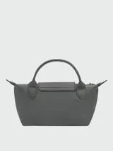 Cartera pouch Le Pliage de Longchamp, modelo compacto en color bordó con asa superior corta y cierre de solapa con botón a presión.