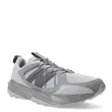 Championes de trail running New Balance modelo Tektrel, color gris con detalles en tonos más oscuros. Presentan un diseño robusto con suela AT Tread para mayor tracción, upper de malla transpirable con refuerzos sintéticos y cierre mediante cordones.