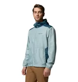 Campera cortavientos Columbia Flashback II en color celeste con capucha y detalles en azul oscuro en hombros y laterales. Cuenta con cierre frontal completo y bolsillos laterales.