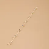 Pulsera de cadena fina en plata 925 con pequeñas esferas distribuidas a lo largo de toda la pieza.