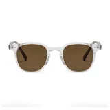 Lentes de sol con armazón de plástico transparente y cristales color marrón. Diseño de estilo clásico con puente definido.