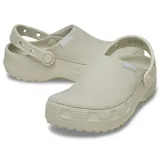 Zuecos Crocs modelo Classic Crafted Clog, de color beige, con parte superior de lona textil y suela de goma Croslite. Incluye correa de talón pivotante y detalles de la marca en el lateral.