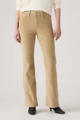 Pantalón de corduroy color beige, de tiro alto y corte flare.