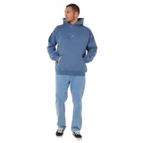 Canguro con capucha Rip Curl, color azul con efecto lavado, bolsillo frontal tipo canguro y logo bordado en el pecho.