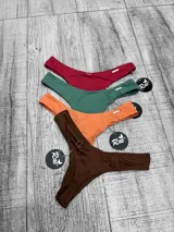 Parte inferior de bikini tipo colaless, de tiro bajo y cobertura mínima, disponible en varios colores sólidos.