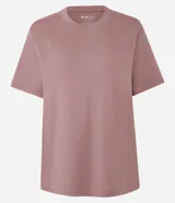 Remera boxy de manga corta y cuello redondo, confeccionada en algodón liso negro de corte holgado.
