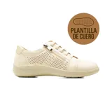 Champion deportivo Korium Confort modelo Georgia de color beige, con diseño perforado en los laterales, cordones elásticos y cierre lateral con cremallera.