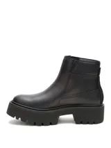 Botas de cuero negro Caterpillar modelo Colorado Max Chelsea, con plataforma chunky, suela dentada de goma y cierre lateral metálico.