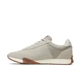 Championes Merrell Sprint Anthem Ltr para hombre, de estilo retro inspirados en el running de los años 70. Confeccionados en una combinación de gamuza y malla transpirable en tonos gris y beige, con la característica letra "M" en el lateral. Suela exterior de goma con detalle envolvente en la puntera y el talón.
