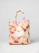 Bolso tipo tote bag con estampado abstracto en tonos amarillo, rosa y violeta. Tiene doble asa de mano y logo de la marca estampado en blanco.