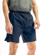 Short deportivo corto de poliéster color azul marino, con cintura elástica.