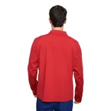 Buzo deportivo rojo con cierre de media cremallera, cuello alto y mangas largas. Presenta el logo de Umbro bordado en blanco en el pecho izquierdo y el escudo del Club Nacional de Football en el pecho derecho.