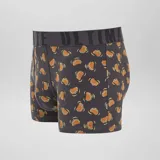 Pack de tres bóxers de hombre con cintura elástica con la inscripción "Ultimate". Un bóxer es gris liso, otro es verde con estampado de aguacates y el tercero es negro con estampado de hamburguesas.