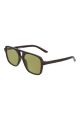 Lentes de sol con armazón de acetato color marrón oscuro y diseño tipo aviador con puente doble. Lentes con tonalidad verdosa.