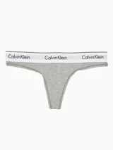 Colaless de tiro medio confeccionada en mezcla de algodón modal, color gris melange, con cintura elástica distintiva con logo de Calvin Klein.