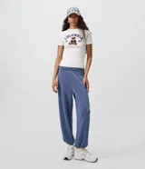 Pantalón aladín de microfibra color azul, de corte amplio con caída fluida, cintura ancha plegable y bajos elastizados.