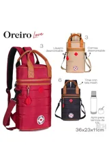 Mochila matera de diseño vertical, color fucsia, con acabado acolchado y detalles en cuero sintético color suela. Cuenta con doble asa superior, correas ajustables y cierre frontal con tirador decorativo. Incluye logo circular con corazón en la parte inferior.