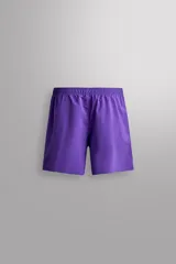 Pantalones deportivos cortos Zara Athleticz, confeccionados en tejido técnico ligero y elástico en color celeste. Cuenta con cintura elástica ajustable, bolsillos frontales, bajo con aberturas laterales y detalle de logo estampado.