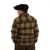 Camisa de manga larga con estampado de tartán en tonos azul marino, rojo y blanco. Confeccionada en 100% lana, con cuello abotonado y puños con botón. Corte clásico.