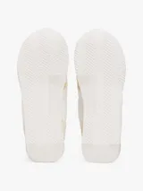 Zapatillas Tommy Hilfiger color blanco con detalles en beige, dorado y verde agua.