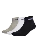 Pack de tres pares de medias Adidas Linear Cushioned, un par negro, un par blanco y un par gris, todas con el logo de Adidas en la parte superior.