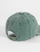 Gorro tipo cap color verde militar con bordado "Balance" en azul en la parte frontal y correa ajustable en la parte trasera.