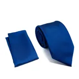Set de corbata y pañuelo de bolsillo en color azul vibrante, con textura geométrica de pequeños cuadrados.