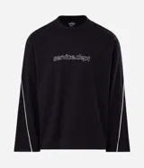 Remera de manga larga Blue Steel, color negro, con diseño de cuello redondo y corte relajado. Presenta un estampado frontal con la palabra 'WORLDWIDE' en letras blancas y detalles de líneas horizontales en contraste.