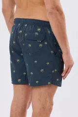 Short de baño azul marino con bordado de pequeñas palmeras, cintura elástica con cordón ajustable y bolsillos laterales.