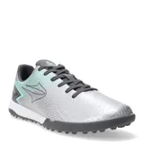 Championes de fútbol 5 Topper modelo Stingray III Mach, color plateado con detalles en gris oscuro y verde agua. Presentan una suela con tapones bajos ideal para césped sintético, cordones grises y logo de la marca en el lateral.