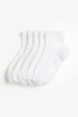 Pack de cinco pares de medias tobilleras blancas en punto acanalado suave con borde superior elástico.