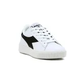 Championes urbanos Diadora modelo Set II, color blanco con logo lateral en negro brillante. Presentan una suela plataforma gruesa con textura acanalada en el borde.
