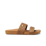 Sandalias de mujer Reef Cushion Vista Braid color tostado, con doble tira ancha de tela trenzada y placa metálica con logo grabado. Presenta una plantilla acolchada de alta comodidad con soporte para el arco.
