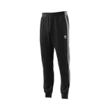 Pantalón Adidas Classics Superstar negro con tres rayas blancas a los costados y logo de la marca bordado en el muslo.