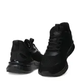 Championes urbanos Umbro modelo Pure Step, color negro, confeccionados en tejido de malla transpirable con detalles sintéticos y logo de la marca en el lateral.