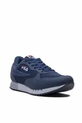 Championes deportivos Fila modelo Jogger Sport II, color azul marino, con suela gris y blanca, y detalles de la marca bordados en el lateral.